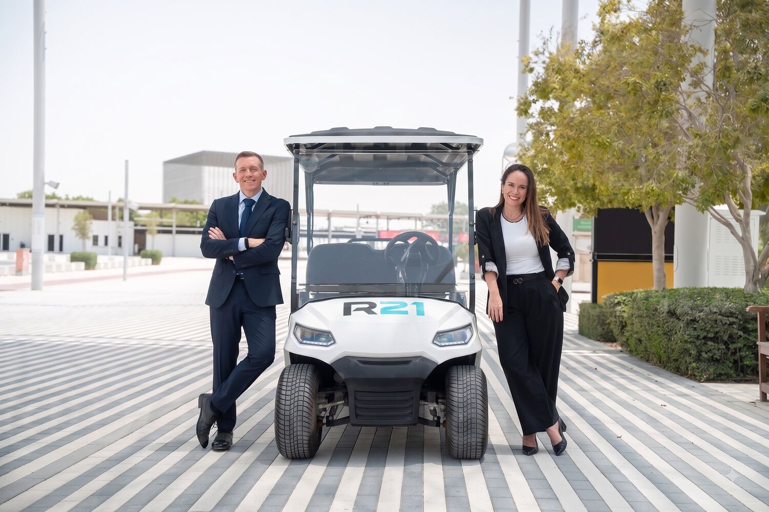 R21 leadership with an R21 buggy at Expo City Dubai